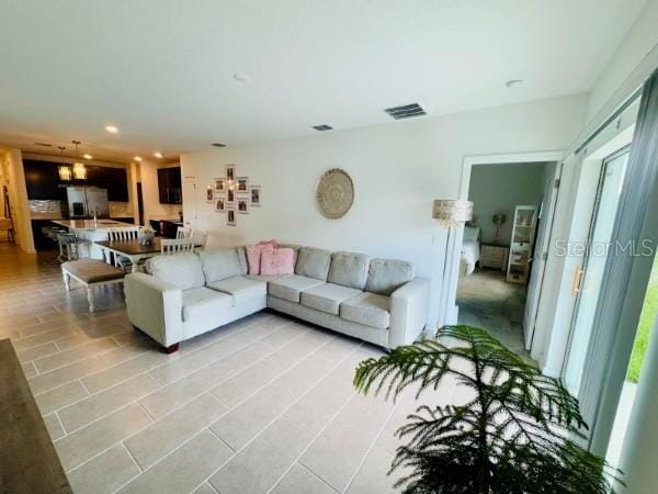 439 Cool Summer Ln, Davenport, FL 33837 - living area with recessed lighting