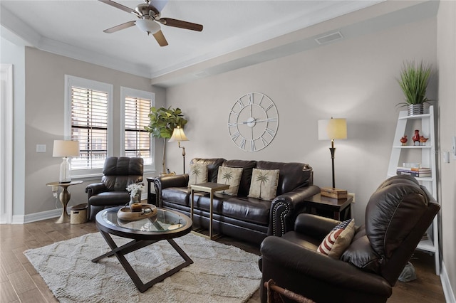 501 Mirasol Cir Unit 304, Kissimmee, FL 34747 - living area with ceiling fan, wood finished floors, and ornamental molding