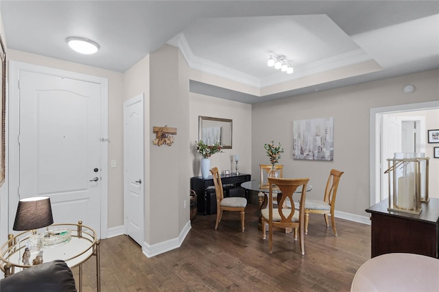 501 Mirasol Cir Unit 304, Kissimmee, FL 34747 - entrance foyer with crown molding and dark wood-style flooring