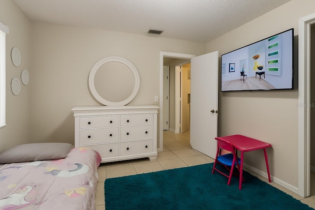 2242 Atrium Cir, Orlando, FL 32808 - bedroom with light tile patterned floors
