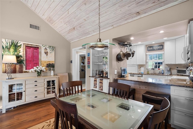 1339 Villa Ln Unit 50, Apopka, FL 32712 - dining room with wooden ceiling, vaulted ceiling, dark wood-style flooring, and recessed lighting