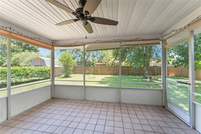 17 Rosewood Dr, Davenport, FL 33837 - unfurnished sunroom with a ceiling fan