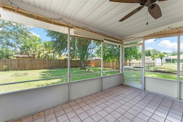 17 Rosewood Dr, Davenport, FL 33837 - unfurnished sunroom featuring ceiling fan