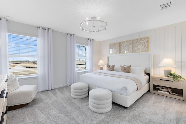 2304 Southbury Dr, Kissimmee, FL 34744 - bedroom featuring a chandelier and carpet flooring