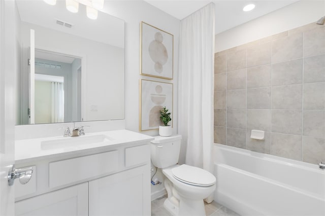2304 Southbury Dr, Kissimmee, FL 34744 - bathroom featuring vanity, shower / bath combo with shower curtain, and tile patterned floors