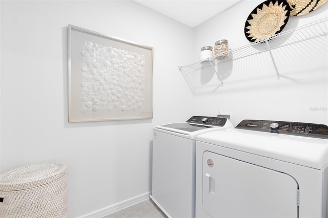 2304 Southbury Dr, Kissimmee, FL 34744 - laundry room with independent washer and dryer and light tile patterned floors