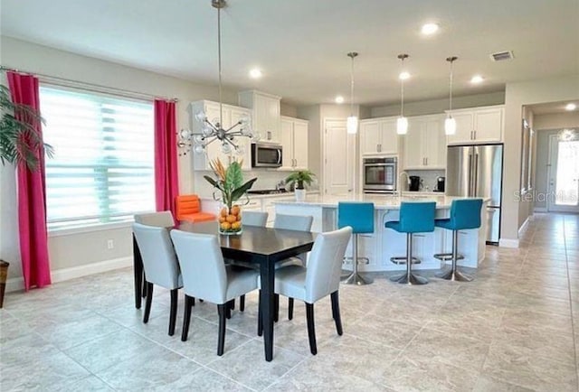 13542 Gorgona Isle Dr, Windermere, FL 34786 - dining space with plenty of natural light, light tile patterned floors, and recessed lighting