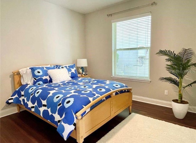 13542 Gorgona Isle Dr, Windermere, FL 34786 - bedroom featuring wood finished floors and baseboards