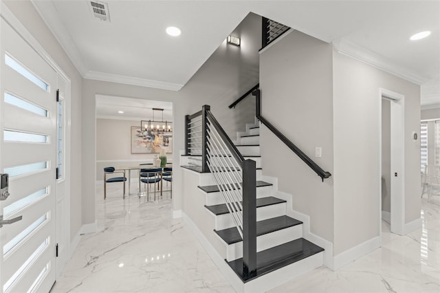 109 E 12th Ave, Windermere, FL 34786 - stairway featuring ornamental molding, marble tiled floors, recessed lighting, and a chandelier