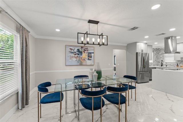 109 E 12th Ave, Windermere, FL 34786 - dining space featuring ornamental molding, light marble finish flooring, recessed lighting, and a chandelier