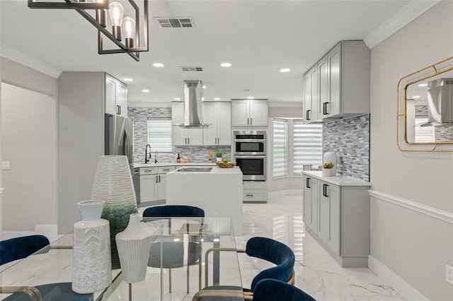 109 E 12th Ave, Windermere, FL 34786 - kitchen with exhaust hood, stainless steel double oven, light marble finish flooring, decorative backsplash, and light countertops