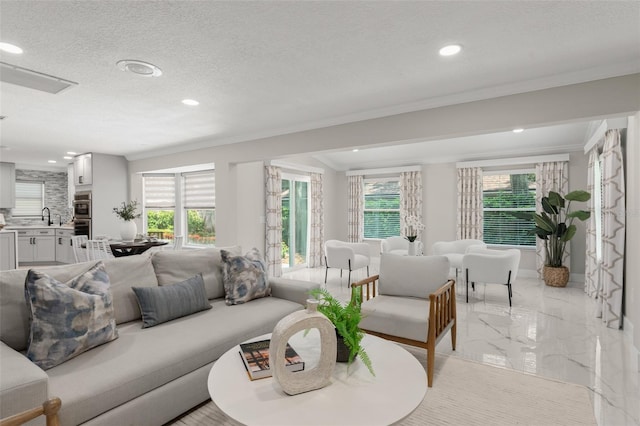 109 E 12th Ave, Windermere, FL 34786 - living area with light marble finish flooring, recessed lighting, ornamental molding, and a textured ceiling