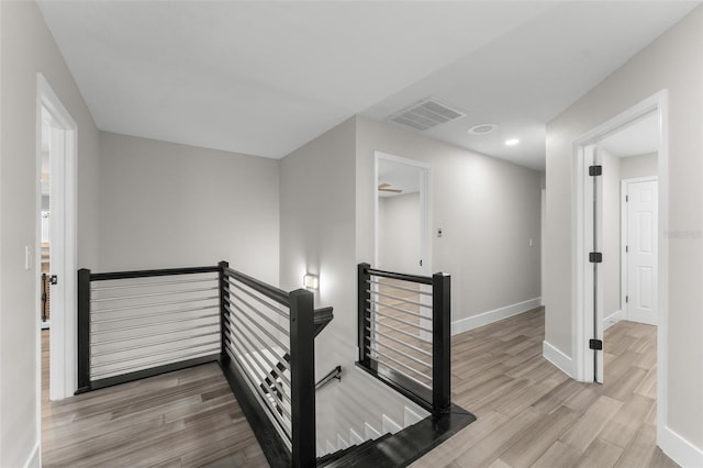 109 E 12th Ave, Windermere, FL 34786 - staircase featuring wood finished floors and recessed lighting