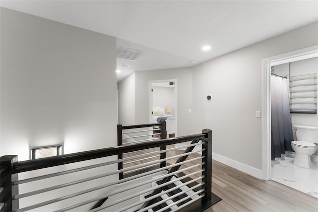 109 E 12th Ave, Windermere, FL 34786 - corridor with an upstairs landing, recessed lighting, and light wood-style flooring