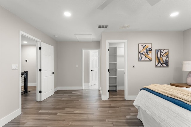 109 E 12th Ave, Windermere, FL 34786 - bedroom with attic access, recessed lighting, wood finished floors, and a spacious closet