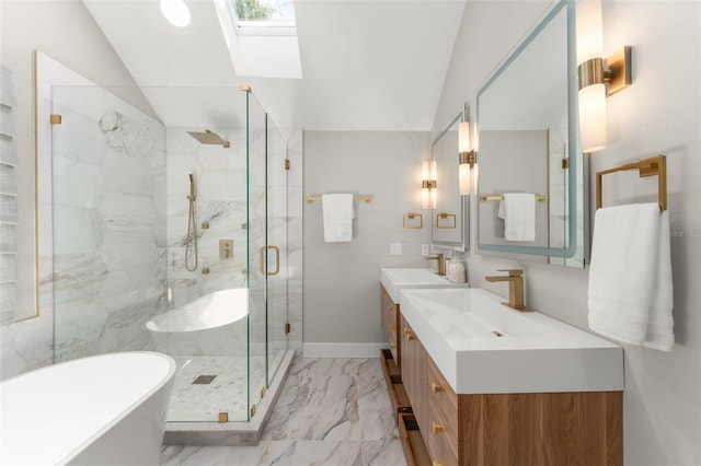 109 E 12th Ave, Windermere, FL 34786 - bathroom featuring lofted ceiling, a skylight, a freestanding bath, double vanity, and a marble finish shower