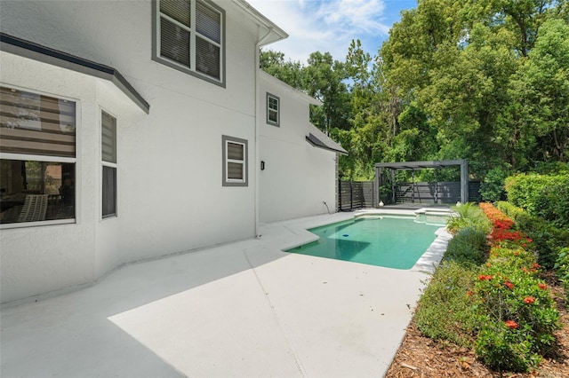 109 E 12th Ave, Windermere, FL 34786 - view of swimming pool featuring a fenced backyard, a patio area, and a pool with connected hot tub