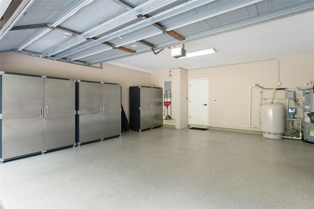 109 E 12th Ave, Windermere, FL 34786 - garage featuring a garage door opener, electric panel, and secured water heater