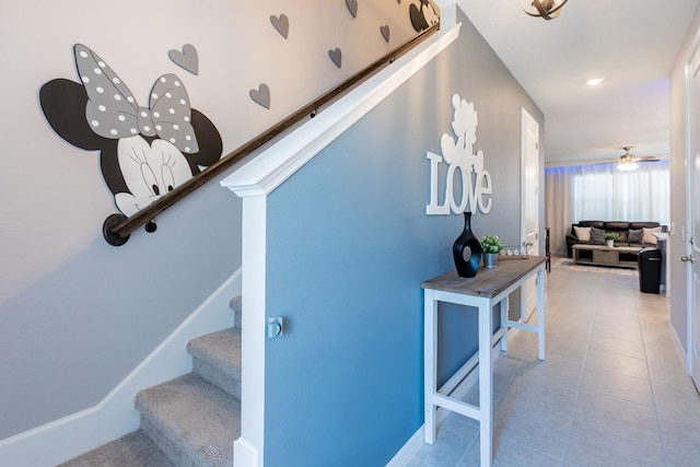 1030 Plantation Ln, Davenport, FL 33896 - staircase with tile patterned flooring and ceiling fan