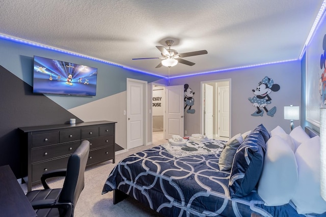 1030 Plantation Ln, Davenport, FL 33896 - bedroom with light carpet, ceiling fan, and a textured ceiling