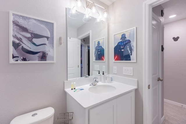 1030 Plantation Ln, Davenport, FL 33896 - bathroom featuring vanity and toilet
