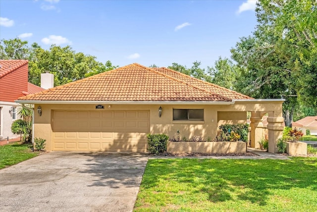 1157 E Winged Foot Cir, Winter Springs, FL 32708 - mediterranean / spanish-style home with a tile roof, concrete driveway, stucco siding, a front lawn, and a chimney