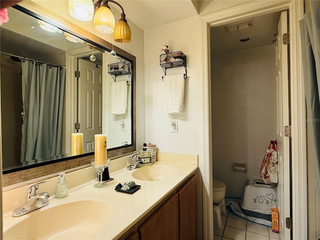 4690 Sussex Ter Unit 103, Orlando, FL 32811 - bathroom featuring tile patterned flooring, double vanity, and a shower with shower curtain