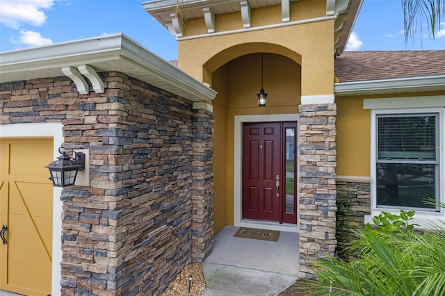1758 Boat Launch Rd, Kissimmee, FL 34746 - entrance to property with stone siding, stucco siding, and a shingled roof