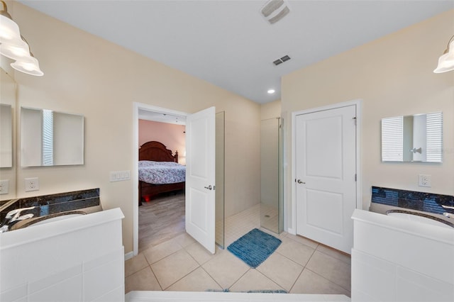 1758 Boat Launch Rd, Kissimmee, FL 34746 - ensuite bathroom featuring a shower stall, two vanities, tile patterned floors, and recessed lighting