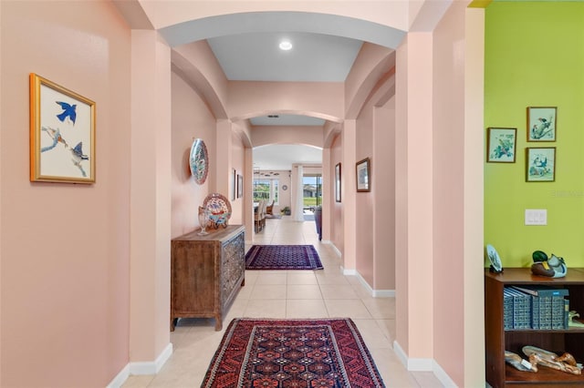 1758 Boat Launch Rd, Kissimmee, FL 34746 - hall featuring arched walkways and light tile patterned floors
