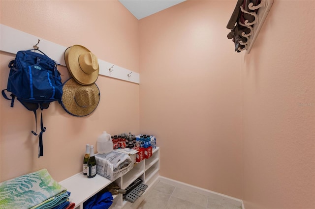 1758 Boat Launch Rd, Kissimmee, FL 34746 - mudroom with light tile patterned floors and baseboards