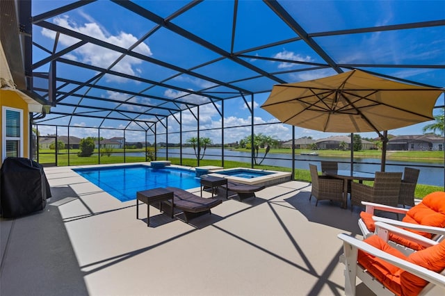 1758 Boat Launch Rd, Kissimmee, FL 34746 - view of swimming pool with a patio area, glass enclosure, a pool with connected hot tub, and a water view