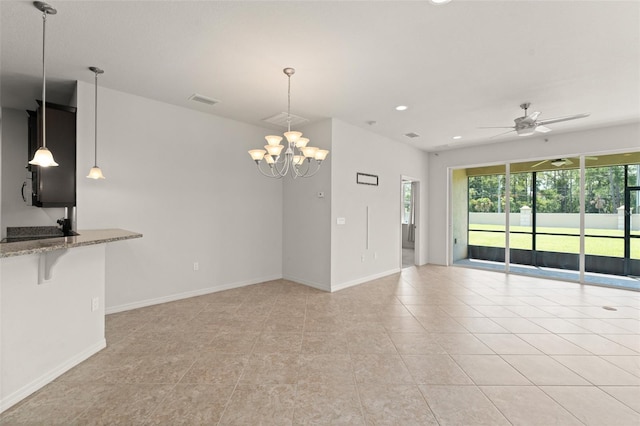 1218 Vienna Square Dr, Winter Haven, FL 33884 - unfurnished living room with healthy amount of natural light, a ceiling fan, a chandelier, recessed lighting, and light tile patterned floors