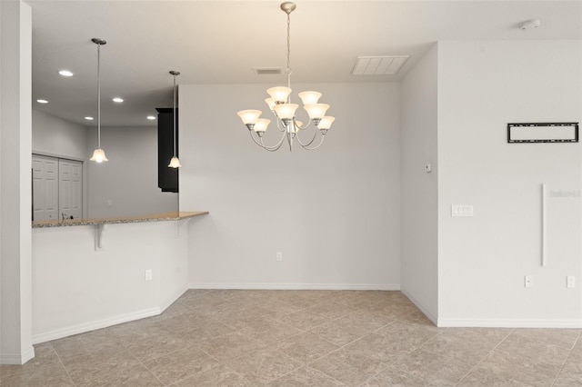 1218 Vienna Square Dr, Winter Haven, FL 33884 - spare room with a chandelier, recessed lighting, and a smoke detector