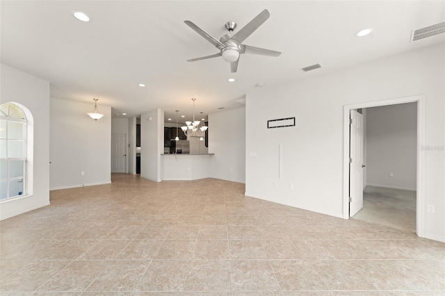 1218 Vienna Square Dr, Winter Haven, FL 33884 - unfurnished living room with a chandelier, ceiling fan, recessed lighting, and light tile patterned flooring