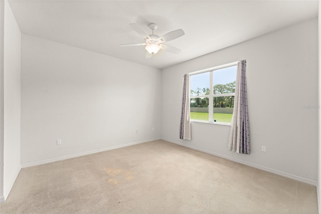 1218 Vienna Square Dr, Winter Haven, FL 33884 - unfurnished room featuring light carpet and ceiling fan