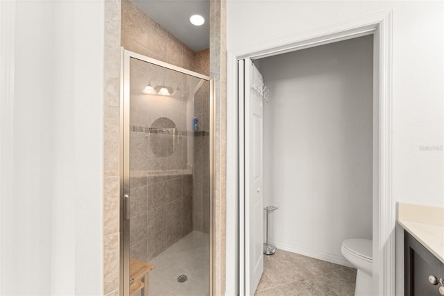 1218 Vienna Square Dr, Winter Haven, FL 33884 - bathroom featuring a shower stall, vanity, and tile patterned flooring