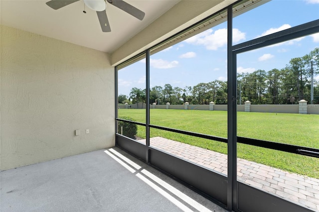 1218 Vienna Square Dr, Winter Haven, FL 33884 - unfurnished sunroom with a ceiling fan