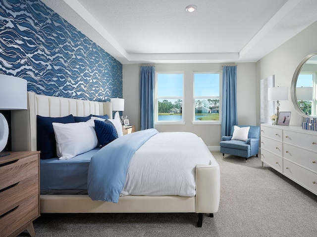 1229 Pampus Dr, Daytona Beach, FL 32124 - carpeted bedroom featuring multiple windows, a tray ceiling, and wallpapered walls