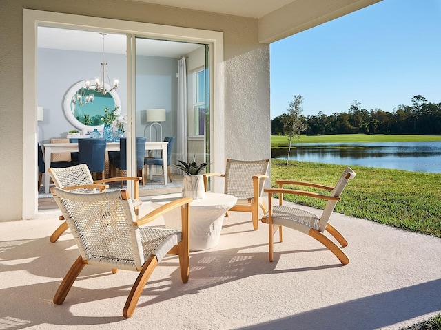 1229 Pampus Dr, Daytona Beach, FL 32124 - view of patio / terrace with a water view