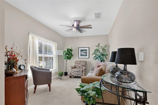 1414 Marsh Meadow Ln, Davenport, FL 33896 - carpeted living area with ceiling fan and baseboards