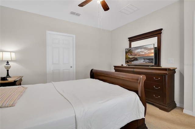 1414 Marsh Meadow Ln, Davenport, FL 33896 - bedroom with light carpet and a ceiling fan