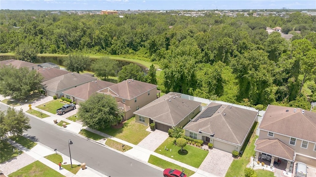 1414 Marsh Meadow Ln, Davenport, FL 33896 - aerial perspective of suburban area featuring a heavily wooded area