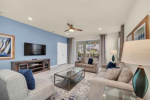 8940 Zurich Ln, Kissimmee, FL 34747 - living area with a ceiling fan and recessed lighting