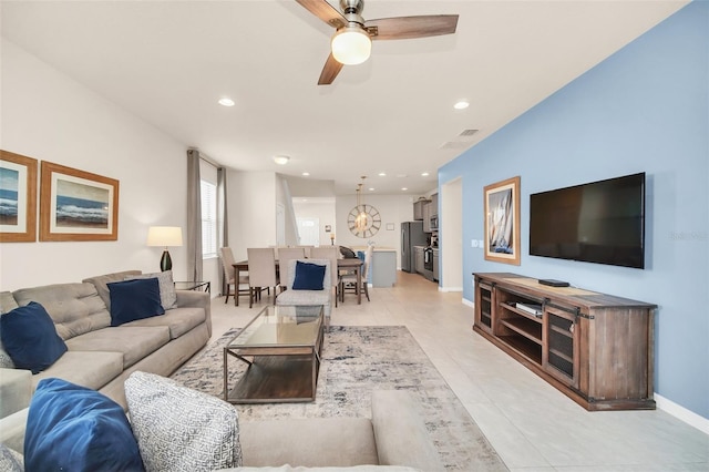 8940 Zurich Ln, Kissimmee, FL 34747 - living room featuring ceiling fan, recessed lighting, and light tile patterned floors