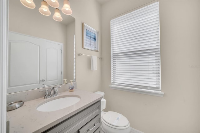 8940 Zurich Ln, Kissimmee, FL 34747 - bathroom featuring vanity and a chandelier