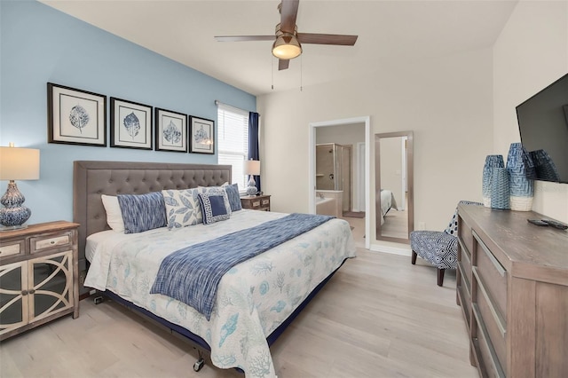 8940 Zurich Ln, Kissimmee, FL 34747 - bedroom with light wood-style flooring, ceiling fan, and connected bathroom