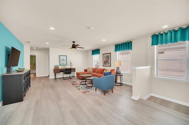 8940 Zurich Ln, Kissimmee, FL 34747 - living room featuring light wood finished floors, recessed lighting, and ceiling fan