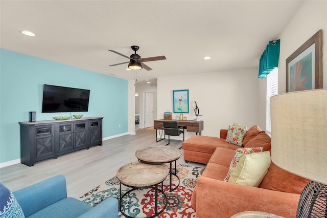 8940 Zurich Ln, Kissimmee, FL 34747 - living room featuring light wood-type flooring, ceiling fan, and recessed lighting
