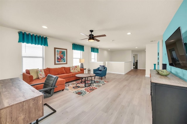 8940 Zurich Ln, Kissimmee, FL 34747 - living area featuring ceiling fan, light wood-style flooring, and recessed lighting